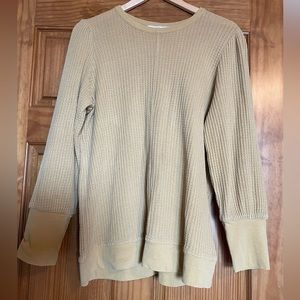 Pale gold waffle knit top.